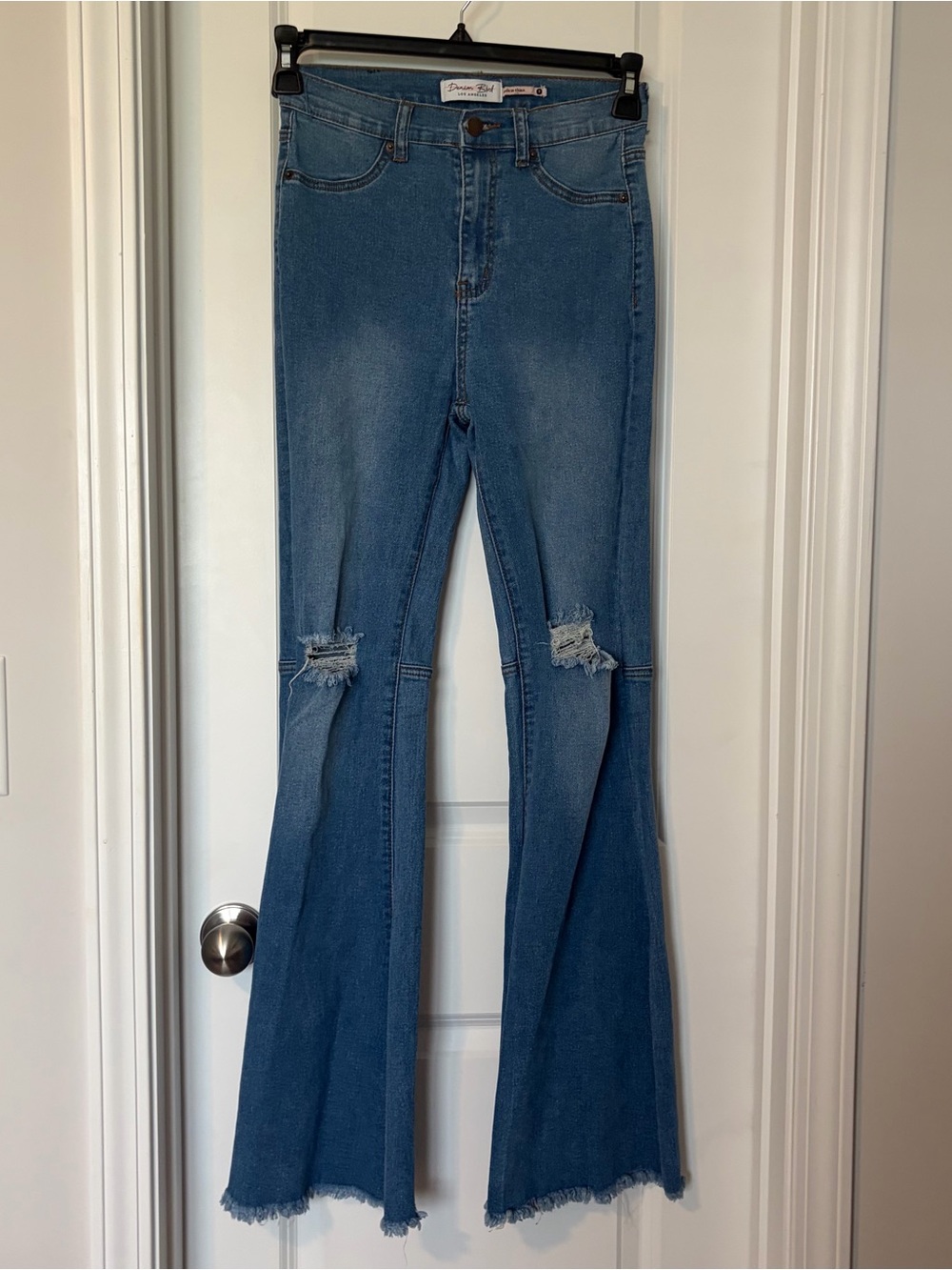 Denim Blvd High-Rise Distressed Flare Jeans in Medium Blue
Size 7